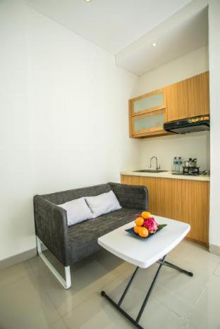 Η κουζίνα ή μικρή κουζίνα στο Deva Bali Apartement