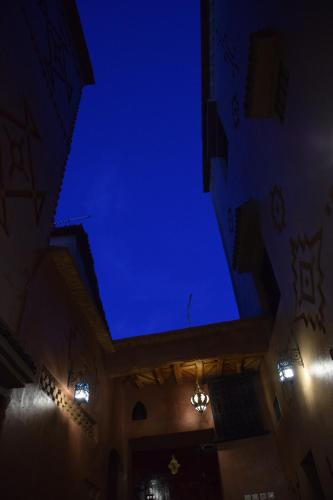 a blue ceiling in a building with lights at Kasbah Assafar in Kalaat MGouna