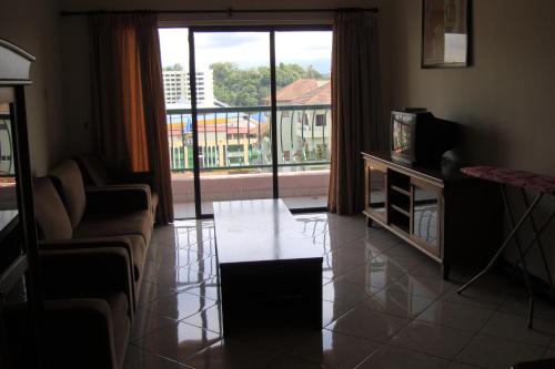 Ruang duduk di Dorcas Service Apartment - Marina Court