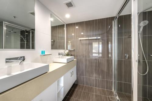 A bathroom at Victoria Square Apartments