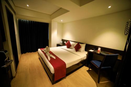 Katil atau katil-katil dalam bilik di Hotel German Palace Near to Airport