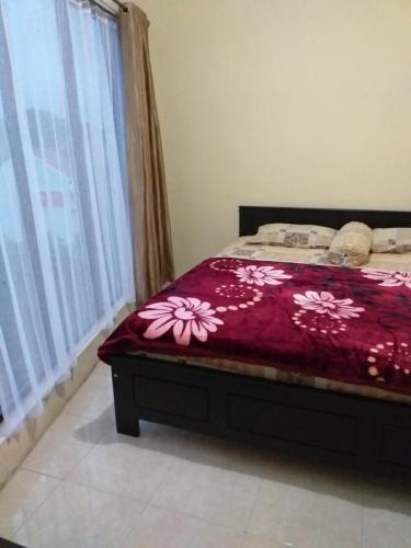 Postel nebo postele na pokoji v ubytování Homestay Penny A