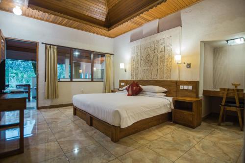Krevet ili kreveti u jedinici u okviru objekta Bali Spirit Hotel and Spa, Ubud