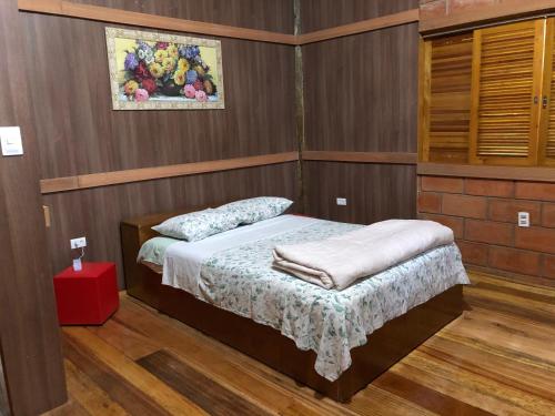 Un ou plusieurs lits dans un hébergement de l'établissement Chale em Itatiba