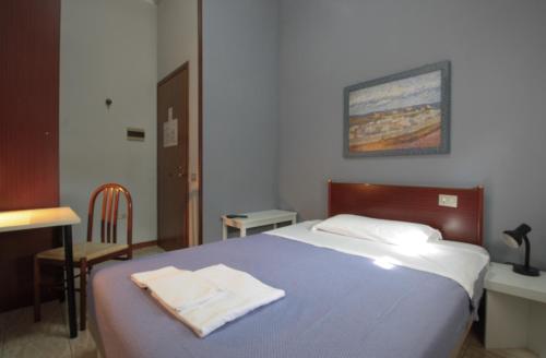 Postel nebo postele na pokoji v ubytování Hotel Rose&Crown