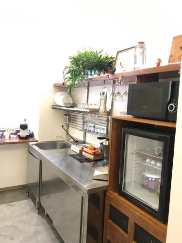 a kitchen with a sink and a counter top at MiraMonti Rooms in Campobasso