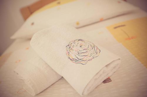 a roll of paper towel with a cupcake on it at Rooms Medved in Samobor