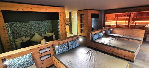 Кровать или кровати в номере Chalet Sinswang am Hochgrat