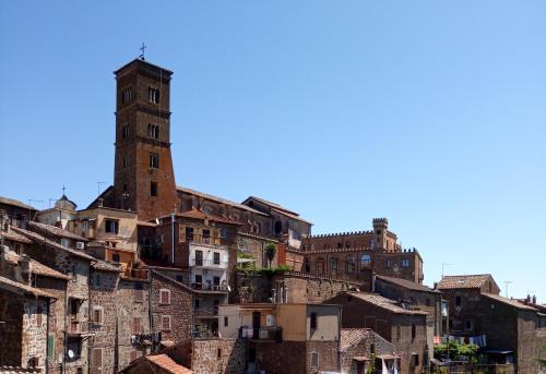 a view of a city with a clock tower at Alloggio turistico Porta Franceta in Sutri