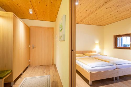 Postel nebo postele na pokoji v ubytování Haus Erika