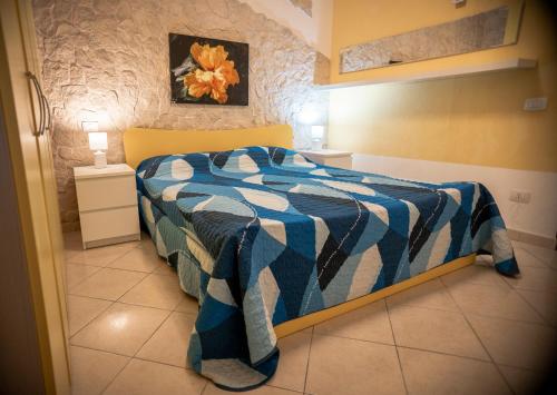מיטה או מיטות בחדר ב-Pinus Village Apartments