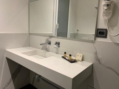Ένα μπάνιο στο Thalya Luxury Rooms