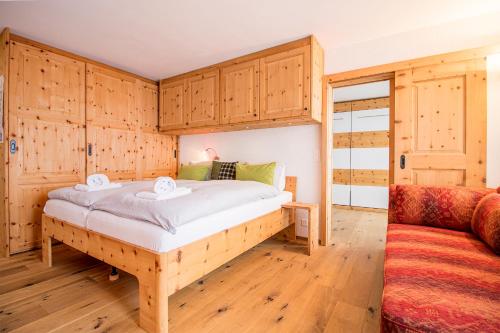 Ein Bett oder Betten in einem Zimmer der Unterkunft Alexandra 611 by Arosa Holiday