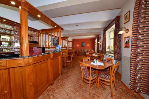 The lounge or bar area at Pension-Restaurace Lugano