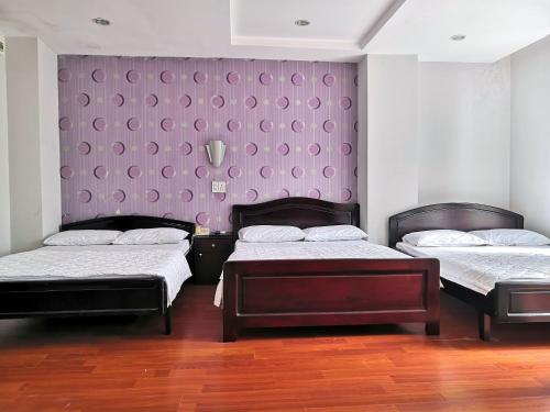 Giường trong phòng chung tại QUỐC TẾ 2 hotel