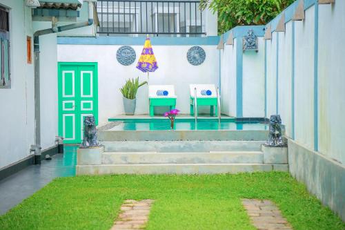 Jardín al aire libre en VILLA No34 HIKKADUWA