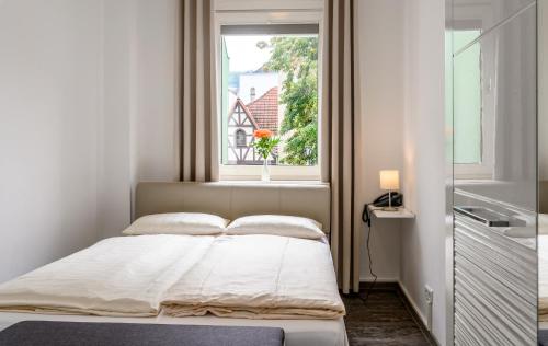Postel nebo postele na pokoji v ubytování Hotel Krone