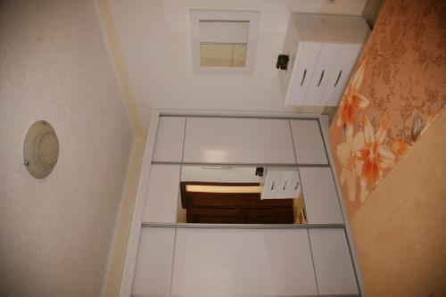 an empty cabinet in the corner of a room at Queen Kodre Apartments in Ulcinj