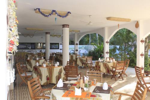 A restaurant or other place to eat at Residence Hotel La Marsu