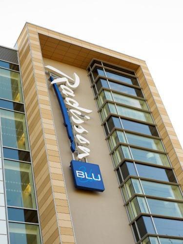 a sign on the side of a building at Radisson Blu Hotel East Midlands Airport in Castle Donington