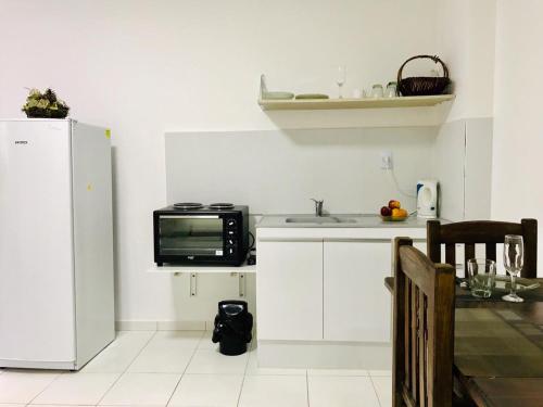 Itá Apartにあるキッチンまたは簡易キッチン