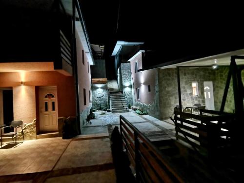 a view of a church at night at Aphrodite Hills Apartments-Stara Planina in Crni Vrh