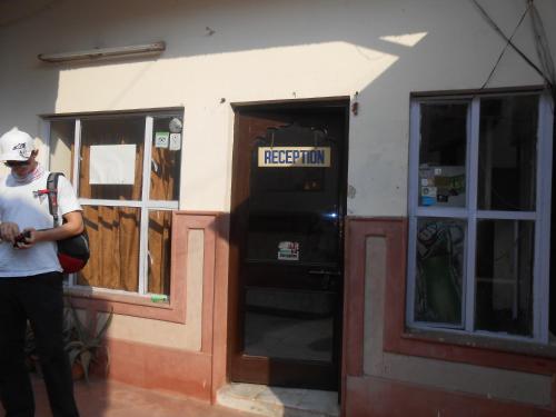 a man standing in front of a repair shop at Hotel Kamal Nearest To Taj Mahal in Agra