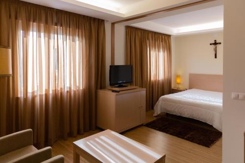 Μια τηλεόραση ή/και κέντρο ψυχαγωγίας στο Hotel Casa Sao Nuno