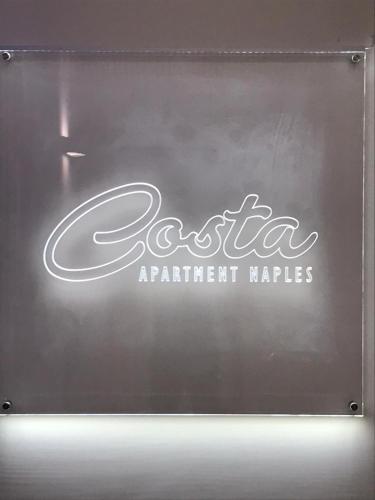 a sign that says geico appliance majors at COSTA APARTMENT NAPLES in Naples
