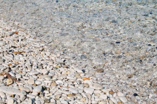 a group of rocks on a beach at Hotel Villa Ombrosa in Portoferraio