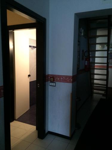 an open door in a room with a hallway at Hotel Letizia in Orte