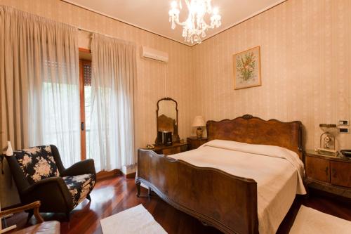 Postel nebo postele na pokoji v ubytování Hotel Letizia
