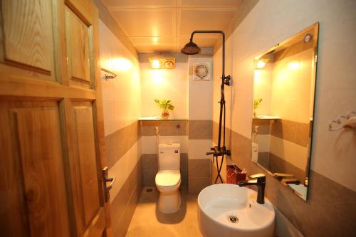 Phòng tắm tại Cozynibi Hotel