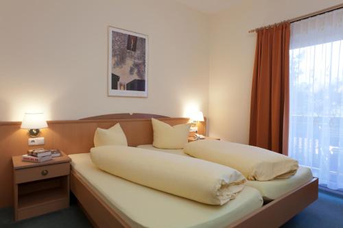 Hotel Garni Gletschertorにあるベッド