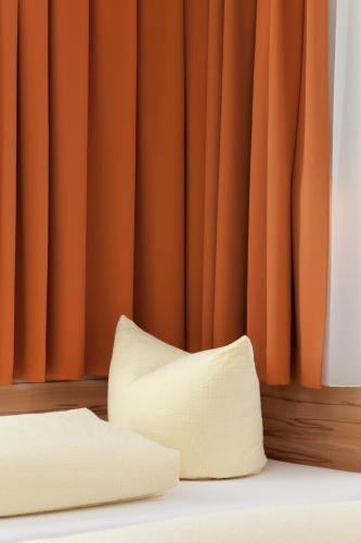 Hotel Garni Gletschertorにあるベッド