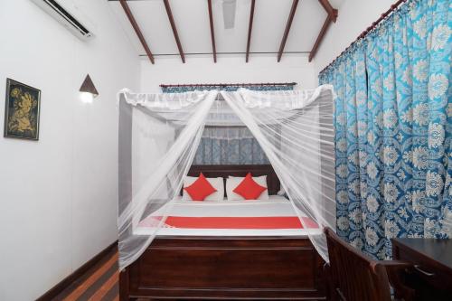 Ένα ή περισσότερα κρεβάτια σε δωμάτιο στο Mass Eco Cabana Yoga & Spa - Unawatuna