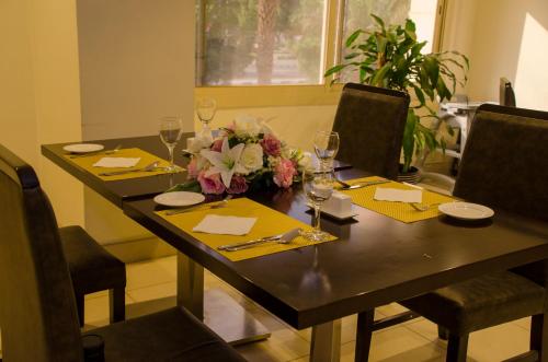 ห้องอาหารหรือที่รับประทานอาหารของ Swiss Spirit Hotel & Suites Taif