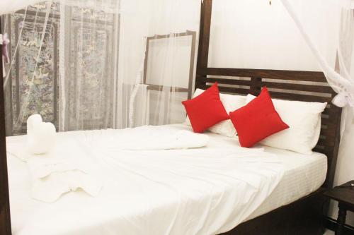 Postel nebo postele na pokoji v ubytování Hotel BEJEWELLED Sigiriya