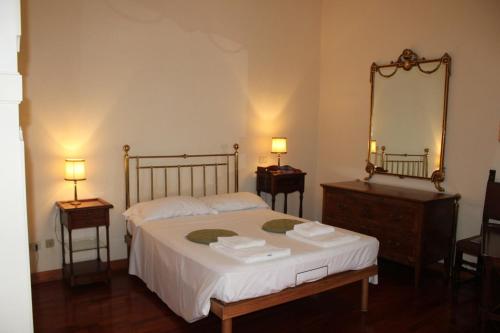 Posteľ alebo postele v izbe v ubytovaní Colosseum New Charming Apartment