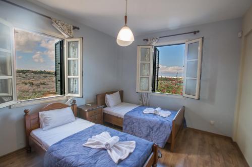 Llit o llits en una habitació de Villa Joy