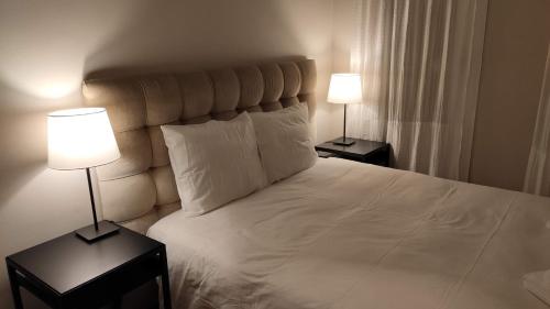 En eller flere senge i et værelse på Apartamento Centro de Historias