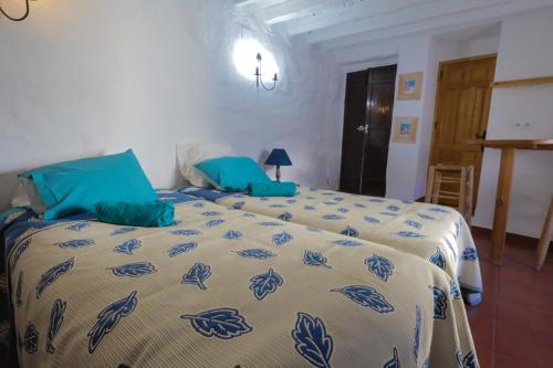 En eller flere senge i et værelse på Casa Hadriano
