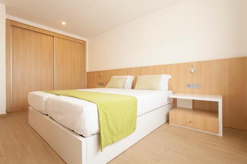 Postel nebo postele na pokoji v ubytování Hotel Da Luz