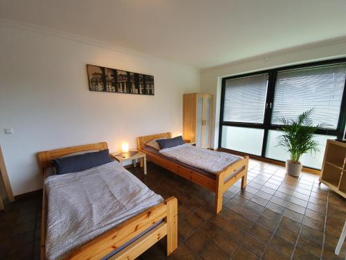 Katil atau katil-katil dalam bilik di Ferienquartier Hamburg