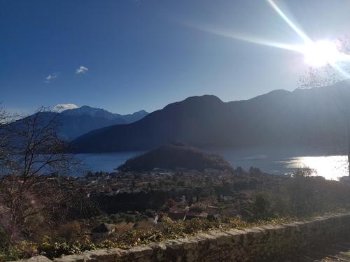 a view of a valley with a lake and mountains at Domus Alba Lenno in Lenno
