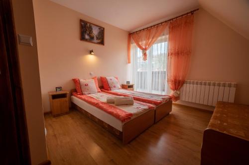 Ένα ή περισσότερα κρεβάτια σε δωμάτιο στο Noclegi u Ilony Czarna Góra