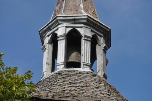a bell tower on top of a building at Hostellerie du Beffroy in Besse-et-Saint-Anastaise