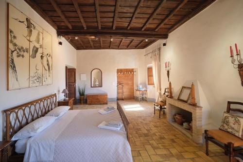 Postel nebo postele na pokoji v ubytování Palazzo Mazzini