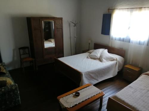 Katil atau katil-katil dalam bilik di La Chacra