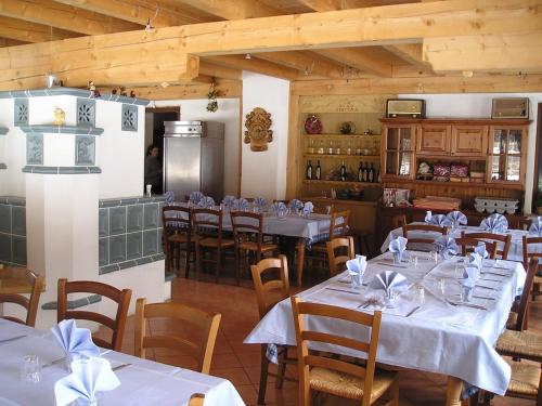 Reštaurácia alebo iné gastronomické zariadenie v ubytovaní La Vecchia Latteria